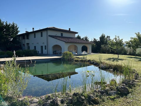 Tuscan farmhouse with bio-lake and beach