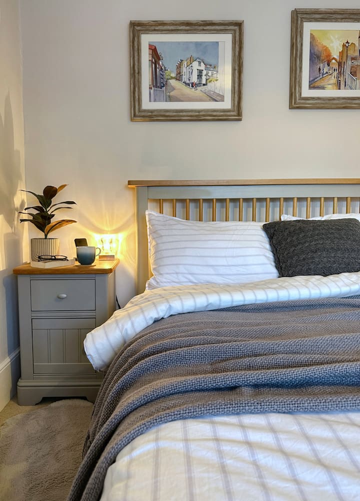 Unwind in comfort, enjoy a peaceful night's sleep in the king size bed.