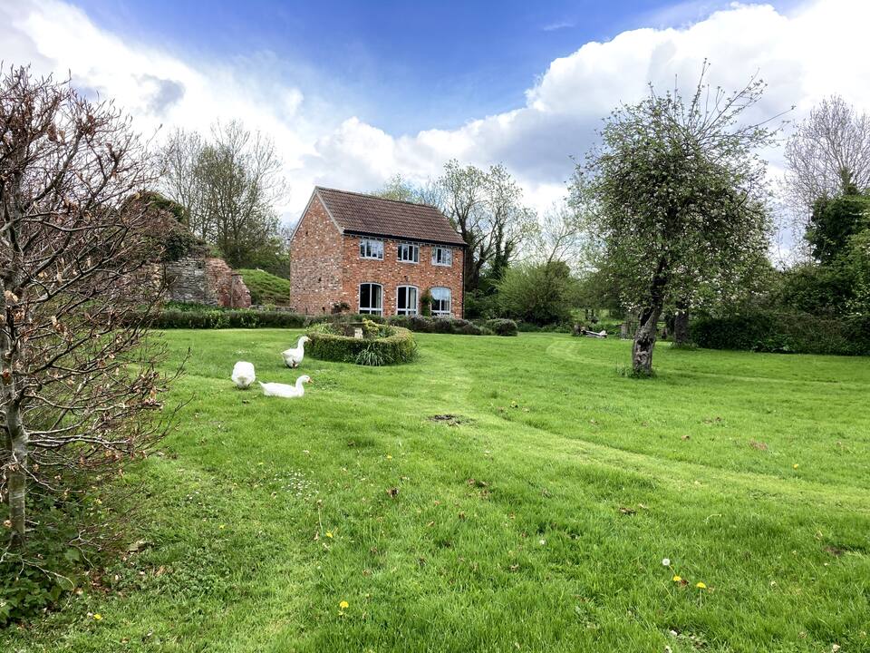 The Stables, by a stream and an old orchard in the Cotswolds, Kingswood, Cotswolds, United Kingdom, photo 1 of 10