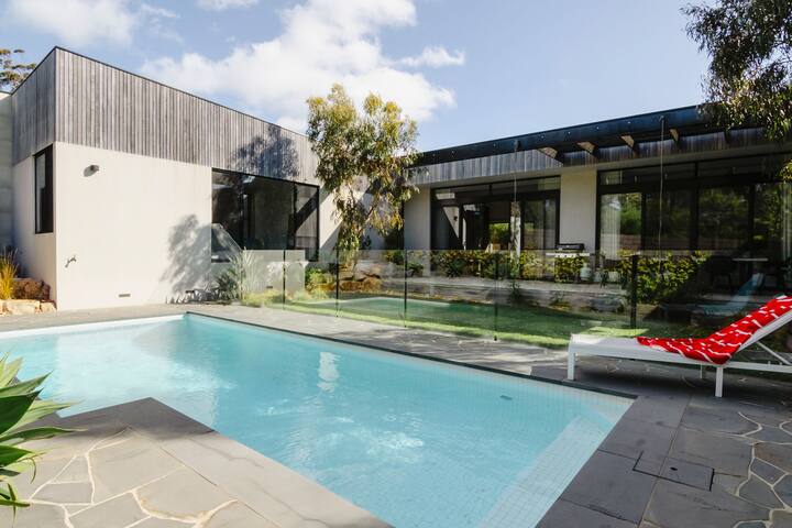 Stylish Beach Retreat w/ Pool & Lush Garden gallery image 3