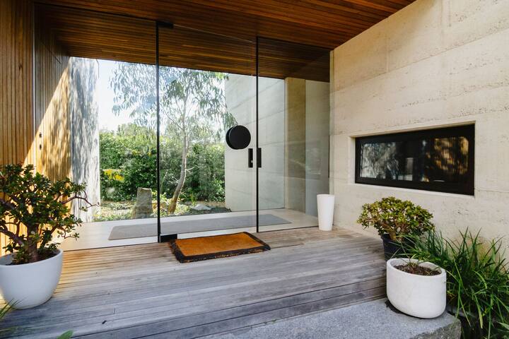 Stylish Beach Retreat w/ Pool & Lush Garden