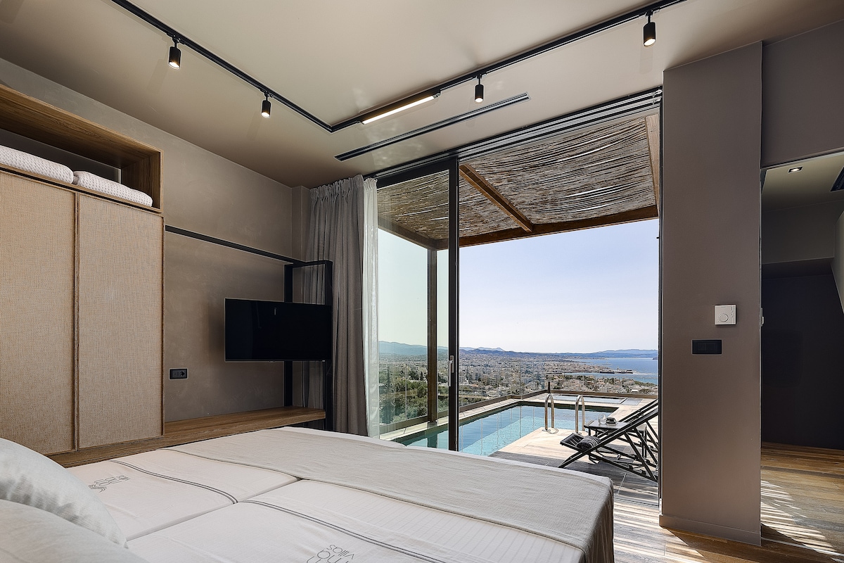 Een balkon met directe toegang tot het tweede privé terras met zeezicht, gelegen op de eerste verdieping! 