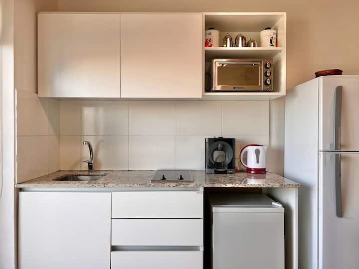 Studio apartment with balcony and panoramic view on a high floor in Chacarita