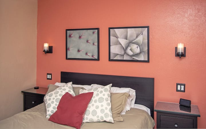 Freshly updated in, this bedroom features dual wall sconces for reading, controlled by switches on either side of the bed (dimmable) along with bright overhead lighting (also dimmable).