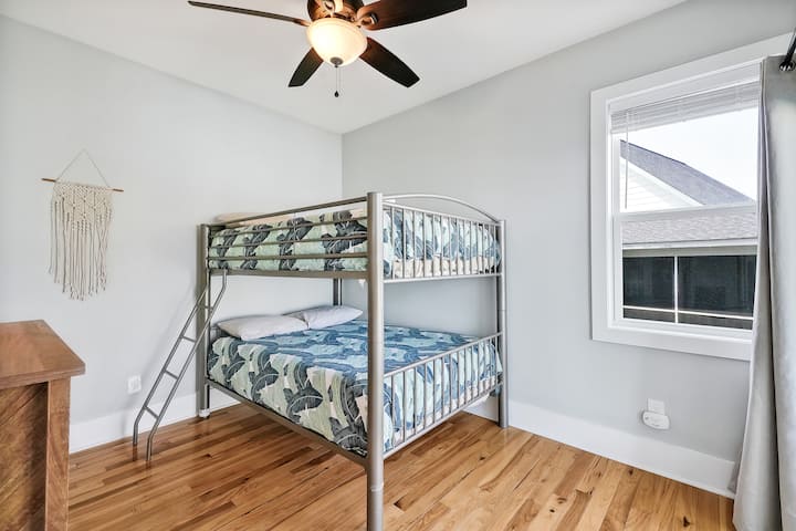 Bunk beds give you more room for activities! ;) These full over full bunks can comfortably sleep 4, and have the same cozy memory foam mattress as the other two beds! 