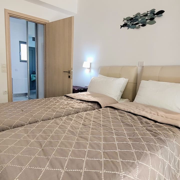 Twee comfortabele bedden met een lengte van 2.10 meter