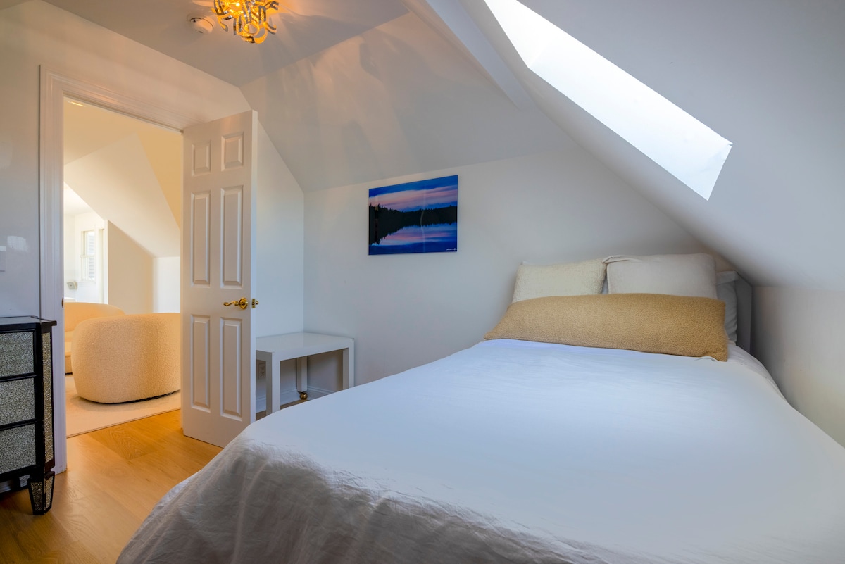 3rd floor east small bedroom, sharing a 1/2 bath on same floor