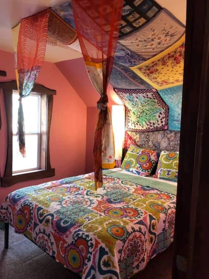 Upstairs bedroom with queen bed and fun canopy!