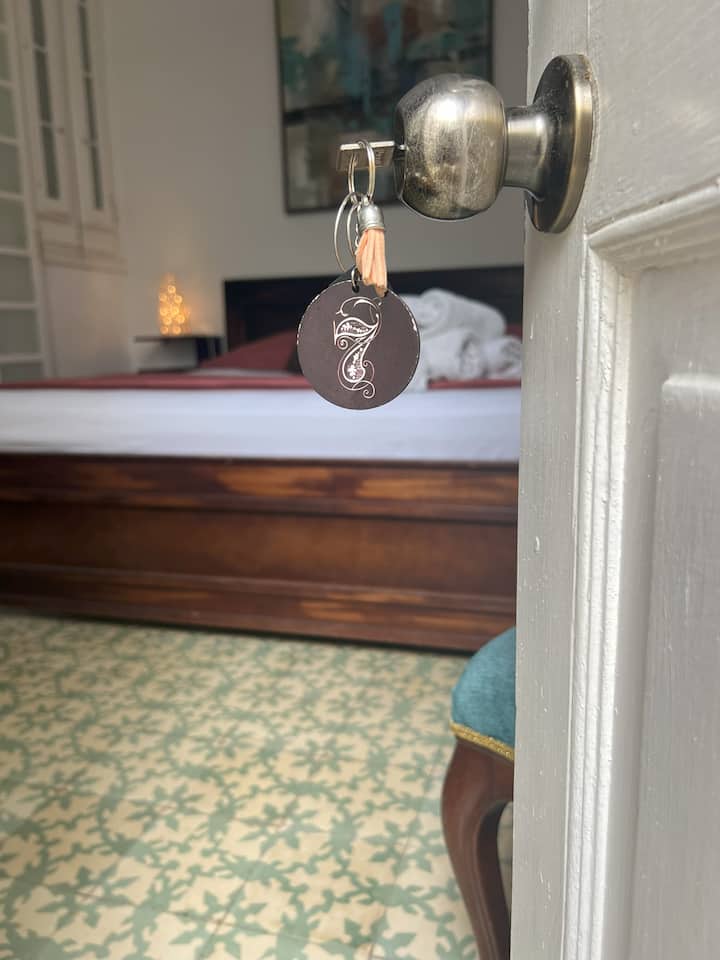 This room is on the first floor. It has a romantic decoration. Its queen size bed, the vanguard design and its relative isolation from the rest of the rooms, places it as a requested room from our guests, especially lovers and newly engaged couples.