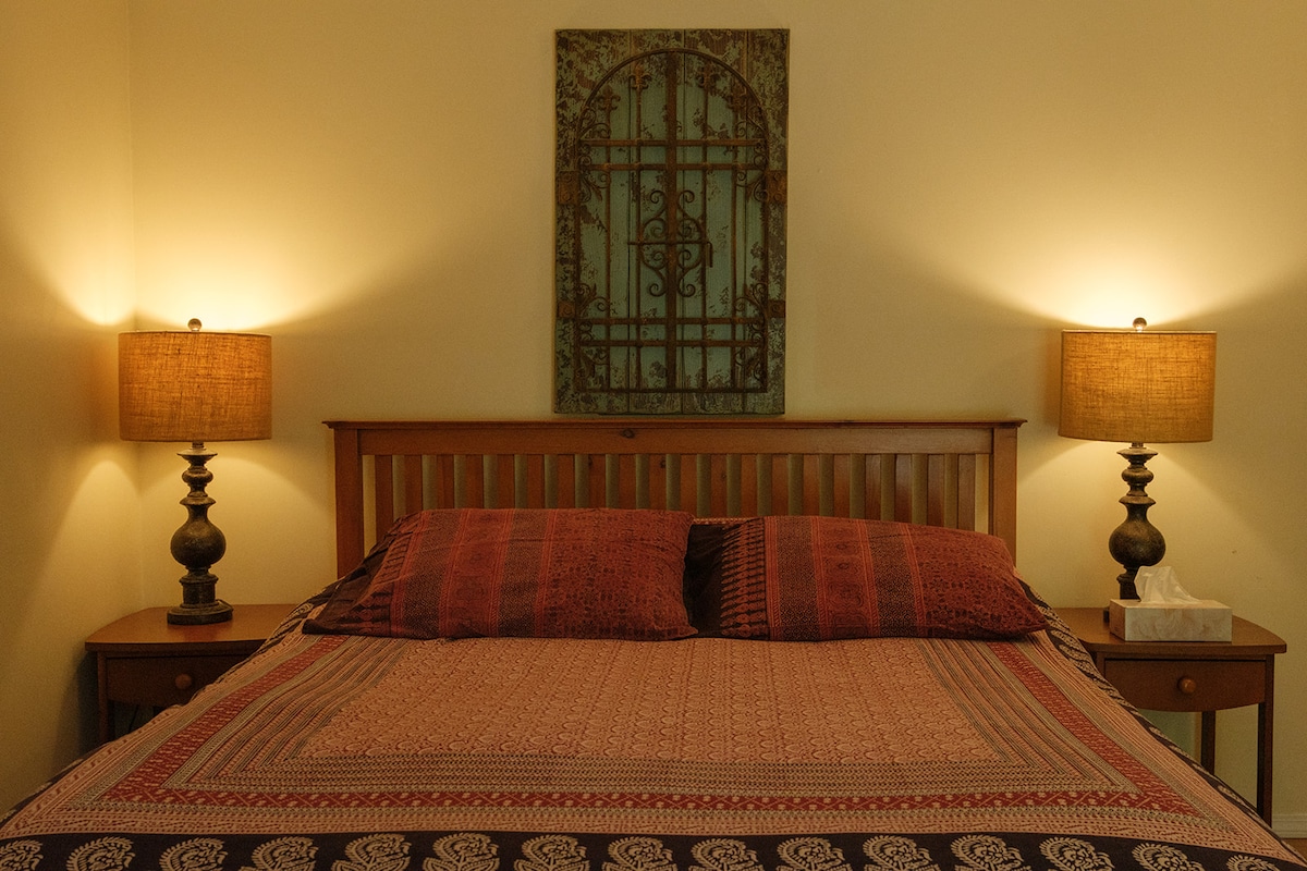 The master bedroom of Rose Cottage boasts a bed with a premium quality mattress and artisan linen. It doesn't get more comfy than this! 