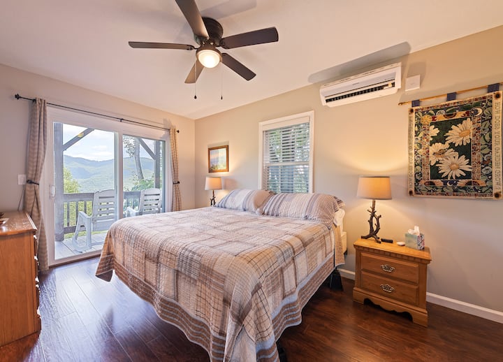 Bedroom with a king bed and its own ensuite bathroom and access to the lower deck.