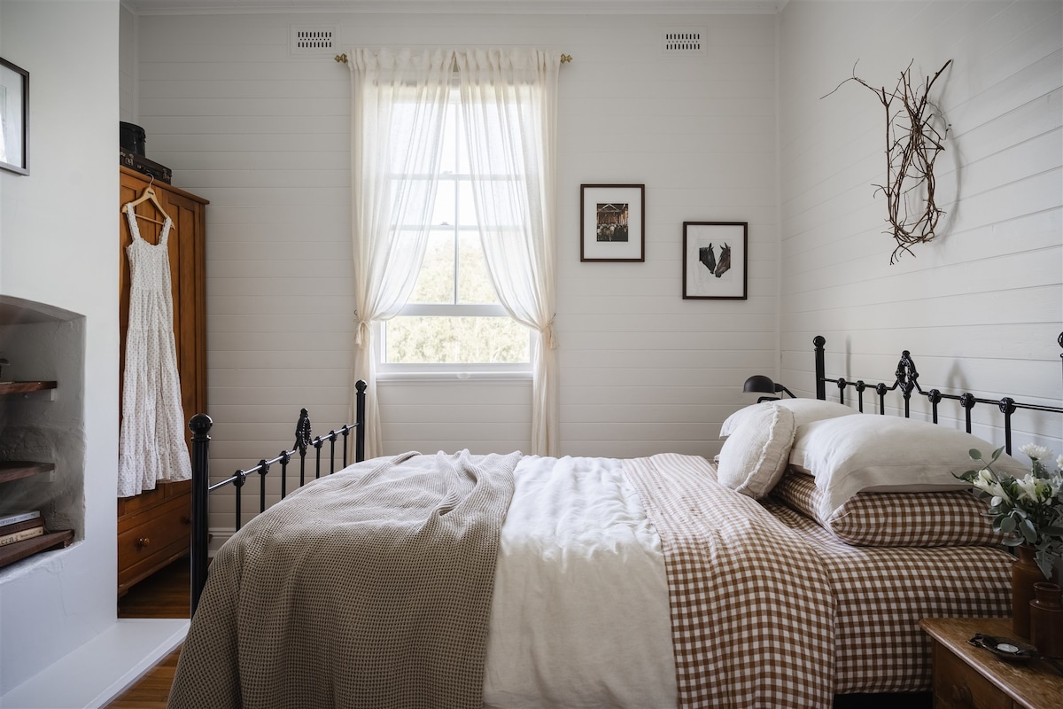 Bedroom 2 - a  queen bed and paddock views
