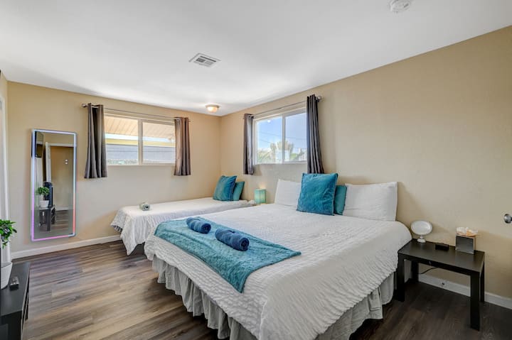 More sleeping space featuring a king size bed and a single bed.