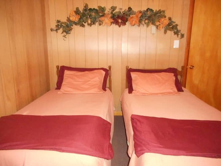 The twin beds have gel infused memory foam toppers and waterproof mattress and pillow covers.