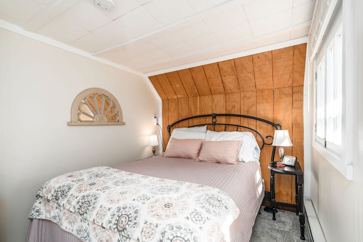 Creek side bedroom- has desk, connecting bath and exit door. Open the window and go to sleep listening to the creek.