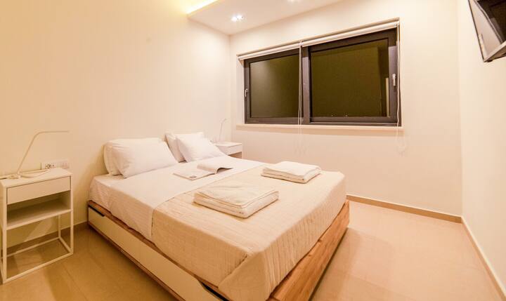 First Floor: Bedroom 4 with queen bed