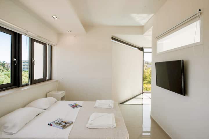 First Floor: Bedroom 2 with queen bed