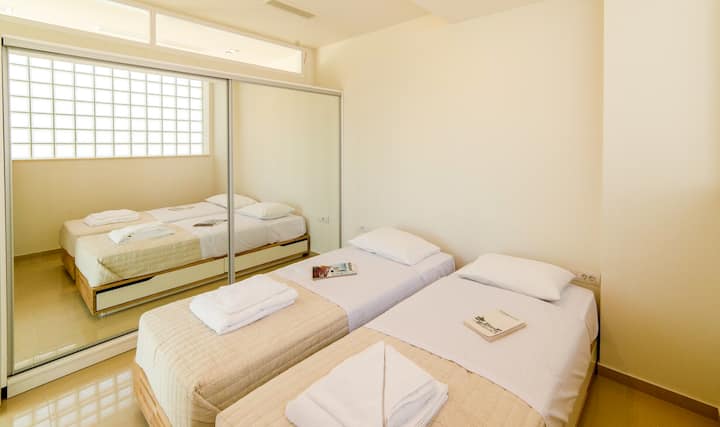 Ground Floor: Bedroom 3 with two single beds (or king bed)