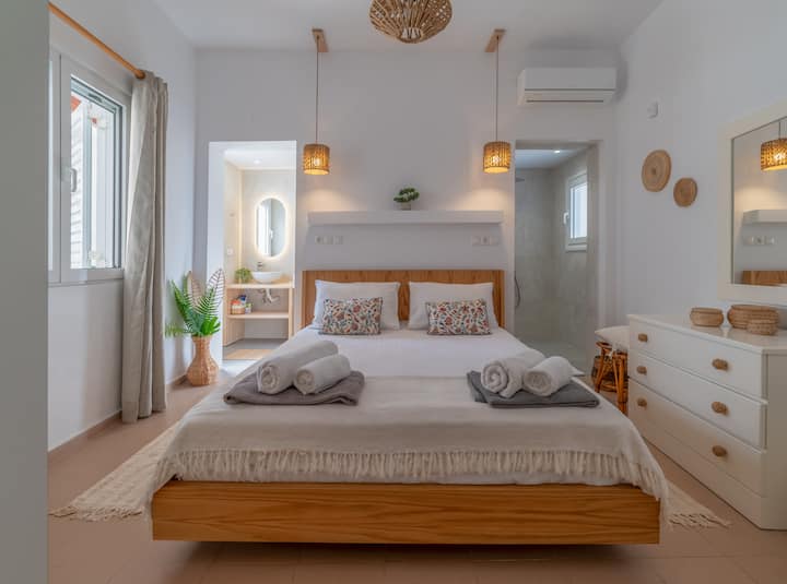 the master bedroom which also has its own bathroom! has a view of the backyard
