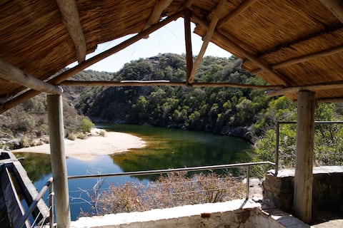 Home, river, pool, gazebo, and deck with a unique view