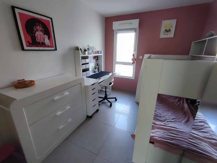 Bunk bed size 90*200 cm. An office area.