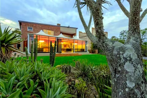 Beautiful Home on the River by Addo