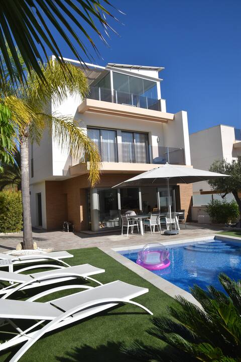 Modern garden villa with private heated pool