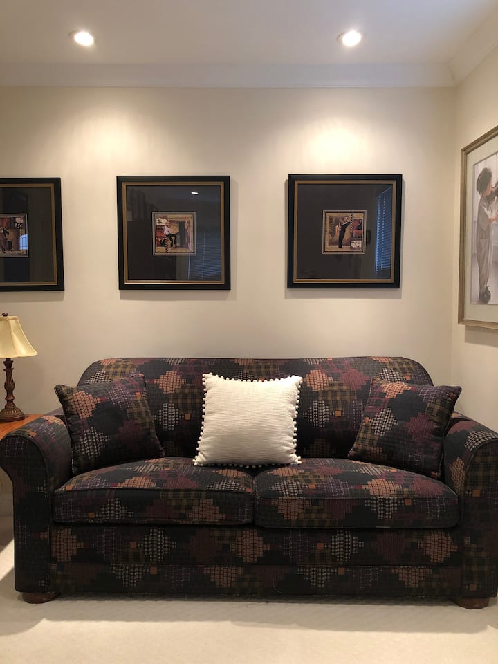 Welcome to the multi-purpose Music Room. Enjoy the sofa as is or, if extra lodging space is required, the sofa bed will be made up in advance of your arrival. This room also contains a small work area and a beautiful piano!