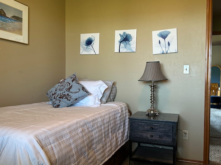 This upstairs bedroom has one twin bed and shares a full bathroom with Bedroom #2.  It has blackout curtains.