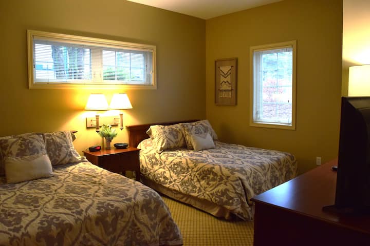Second bedroom off hallway with 2 full size beds.  Bedding may vary but will have same style and comfort.