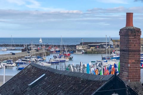 Stylish beach house moments from the sandy beach