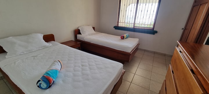 Downstairs bedroom with single beds