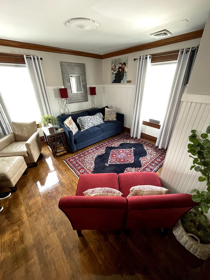 Open Concept Cozy Living Area includes: big screen TV, high-speed Wifi, comfy chairs, and a Hide-a-Bed Sofa for extra sleepers. A Multi Purpose Room with Blackout Drapes.