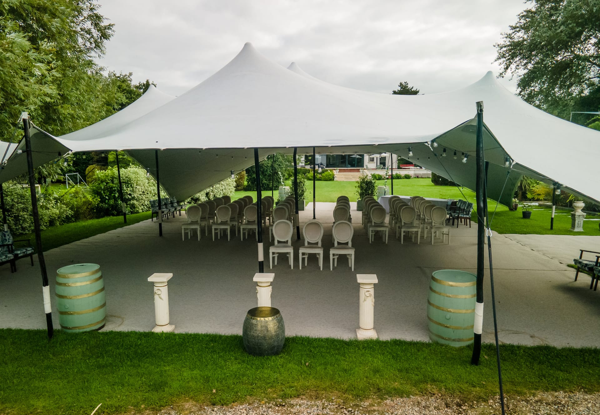 The lawn at Selshan Lodge dressed for a celebration under a canopy