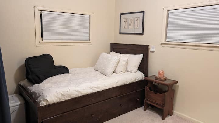 Top bed with memory foam mattress, down pillows and duvet.
Bottom trundle is a twin bed = 2 single beds