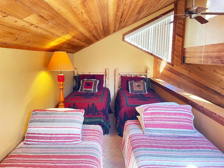 4 twin beds in the loft.  Push 2 together to make a king size bed for another couple.  