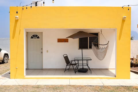 House with 1 bedroom and kitchen.