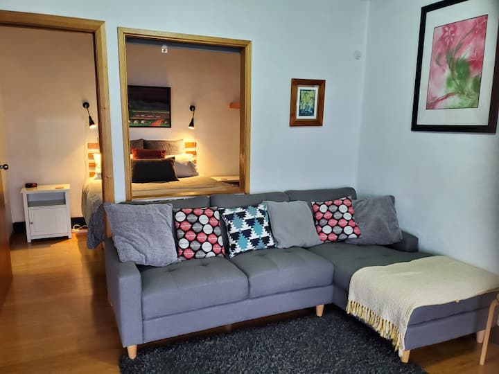 Living room through to bedroom.