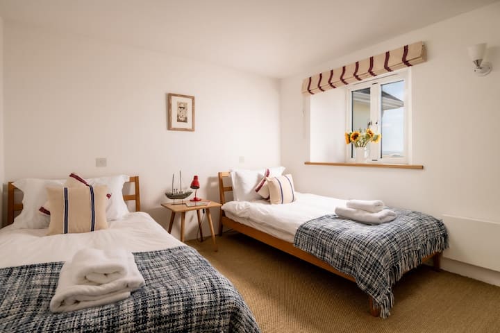 Camera doppia con letti singoli al piano superiore