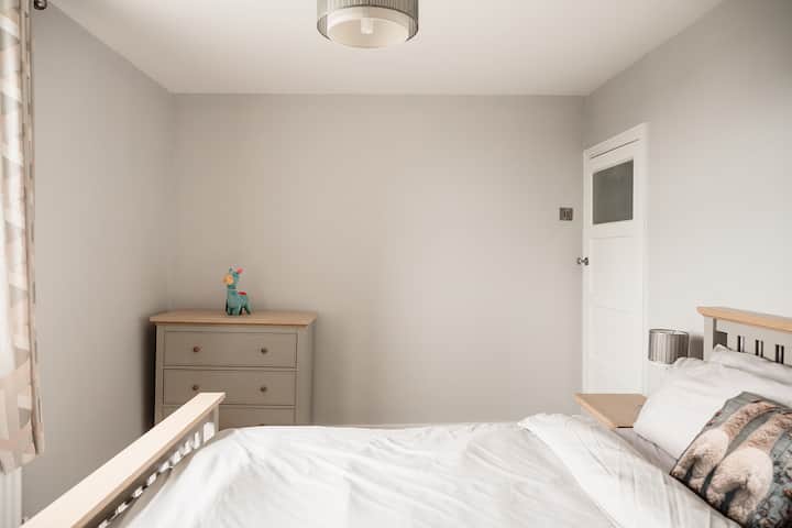 King sized bed and spacious bedroom with wonderful views