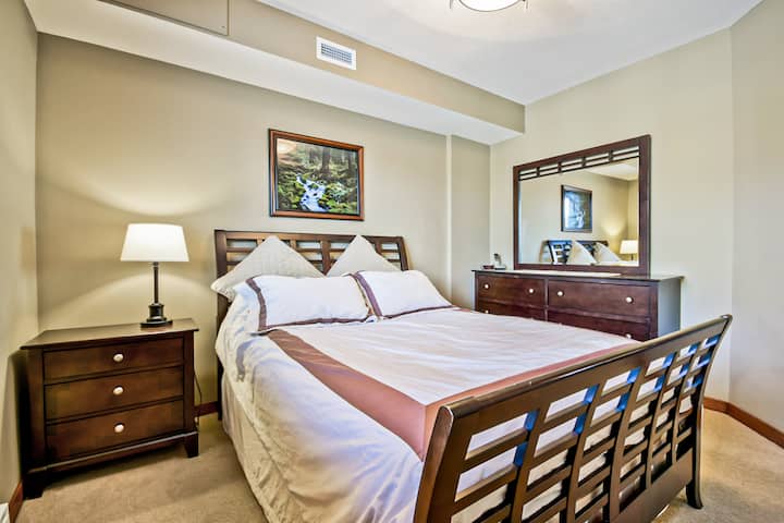 Spacious master bedroom with queen bed, closet and plenty of drawers.