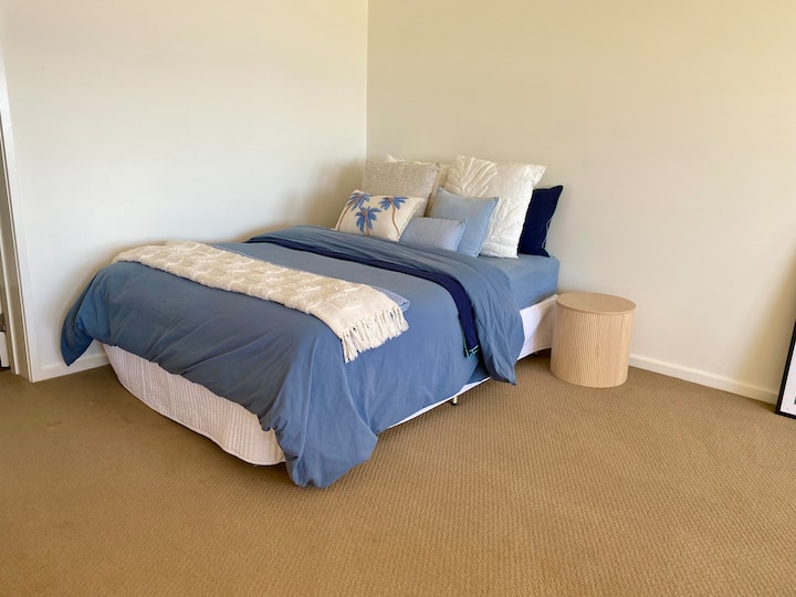 The queen bed is in the downstairs open space with the 3rd living room and ensuite bathroom.