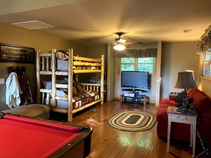 Game Room Upstairs with Twin bunks and Queen sleeper sofa. Pool Table, Wii Console, Ear Plugs, Sound Machine, and Charging Station.