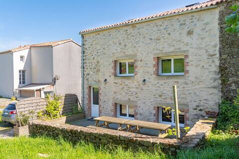 Stone village house on Puy du Fou street