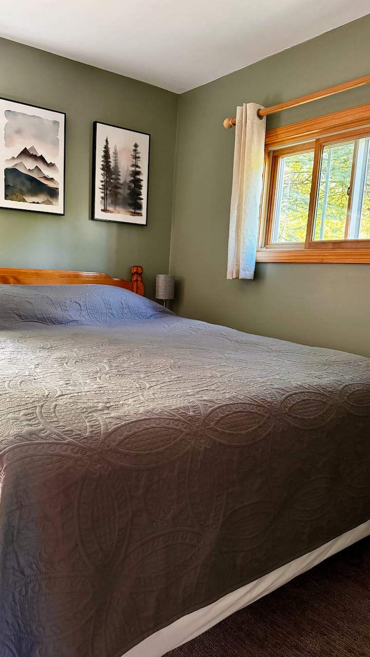 A comfortable queen sized bed.