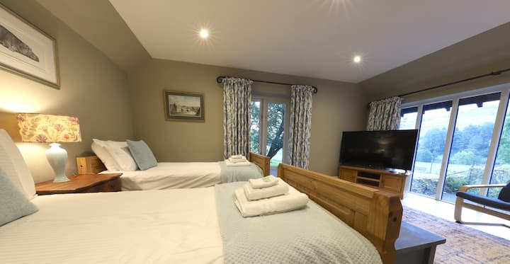 ห้องนอน 5 อยู่ในบ้านโค้ช