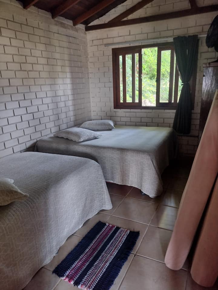 Room 2. Two double beds plus two extra mattresses.