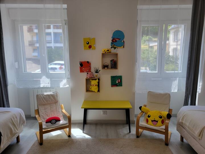 The second bedroom (child or adult), with two single beds 90 x 190, chest of drawers, fan, games area.