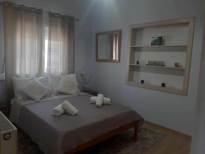 Here we have a double bed, a built in closet, ironing board, iron, clothes hangers. Laminate flooring, with a beautiful bedroom rug. 