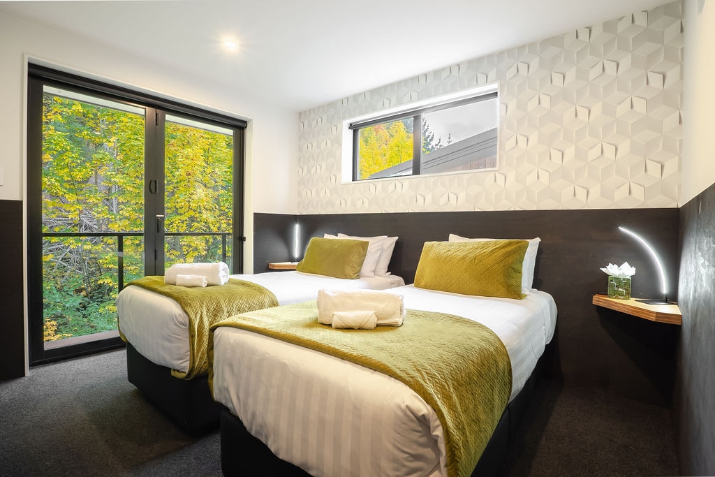 Bedroom 2 can be configured as a king bed or twin singles. 